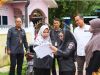 Anggota Bawaslu Provinsi Kepulauan Riau, Maryamah bersama Anggota Bawaslu Kota Tanjungpinang, Rapida dan Anggota KPU Provinsi Kepulauan Riau dan KPU Kota Tanjungpinang Hj. Susanty dalam rangka Coktas PDPB Tahun 2026 